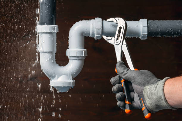 Professional Emergency Plumber technician working in Milford, NH